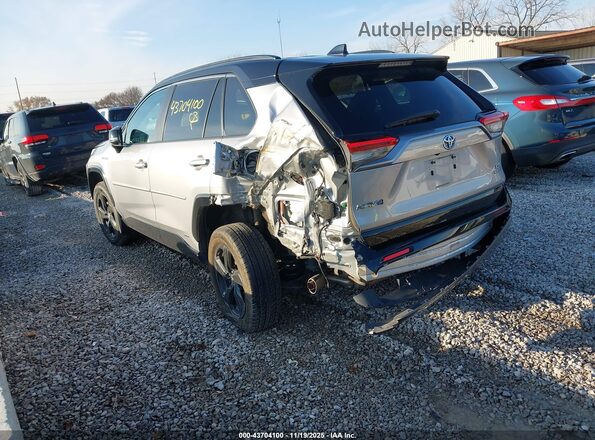 2T3E6RFV0MW021525 2021 TOYOTA RAV4 HYBRID Light Blue Tył lewy