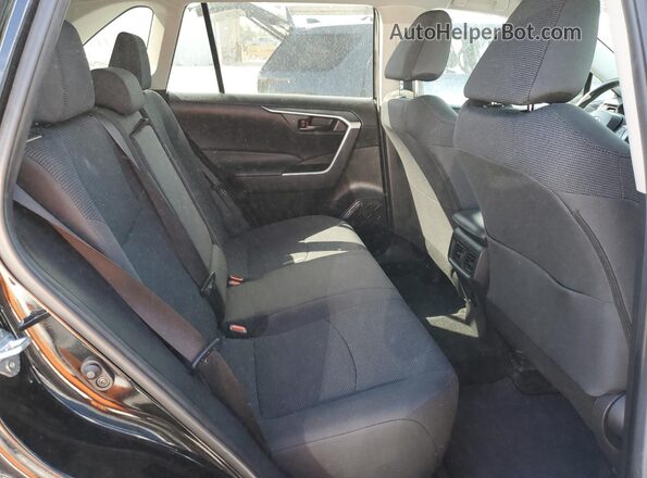 2T3K1RFV0PC239424 2023 TOYOTA LE Black Vista interior trasera