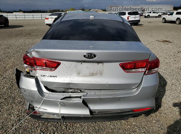 5XXGT4L37JG266425 2018 KIA OPTIMA Серебряный Вид салона спереди