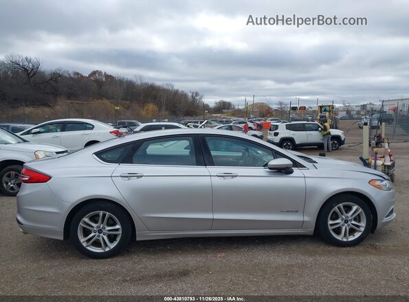 3FA6P0LU1JR221750 2018 FORD FUSION HYBRID Silver Rear interior view