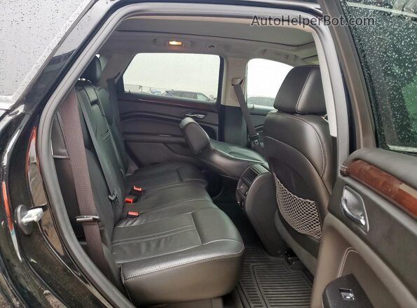 3GYFNCE3XGS562811 2016 CADILLAC SRX Black Вид задньої частини салону