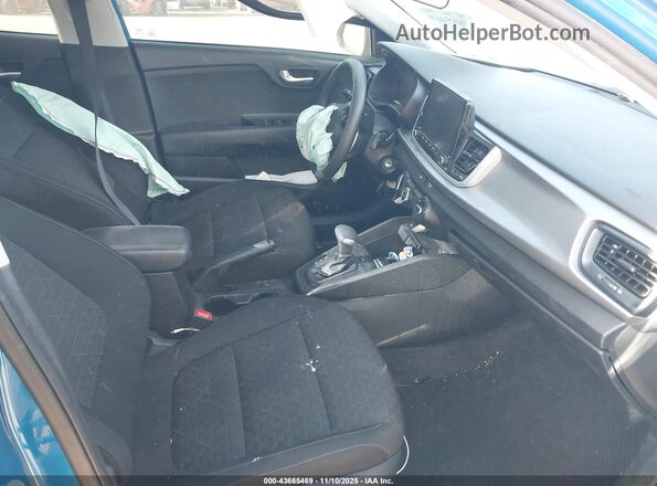 3KPA24AD2PE578013 2023 KIA RIO Blue Вид салону спереду