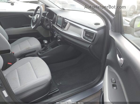 3KPA24AD9LE313003 2020 KIA RIO Gray Front interior view