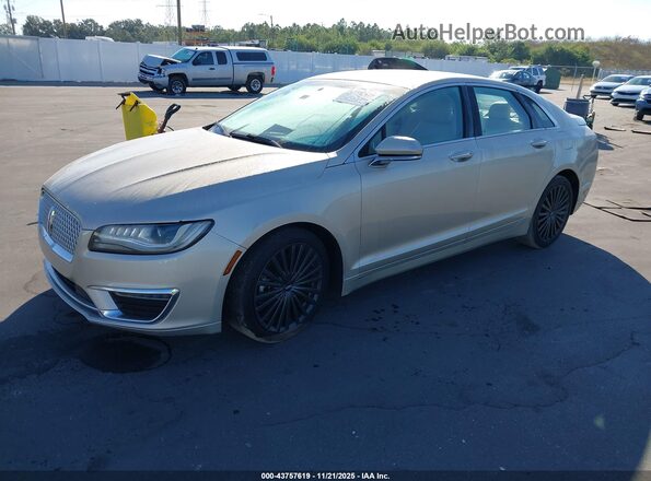 3LN6L5MU3HR650511 2017 LINCOLN MKZ HYBRID Gold Front left