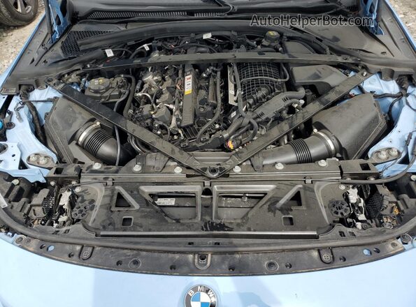 3MF13DM03P8D32489 2023 BMW M2 Blue Սալոնի հետևի տեսք