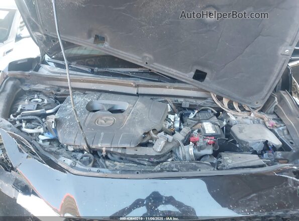 3MVDMBBM5RM672274 2024 MAZDA CX-30 Black Rear view