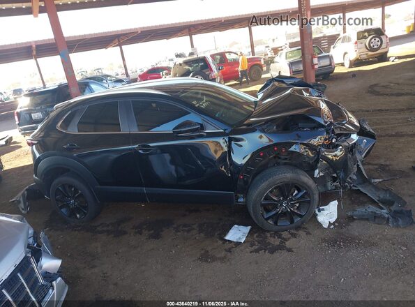 3MVDMBBM5RM672274 2024 MAZDA CX-30 Black Rear interior view