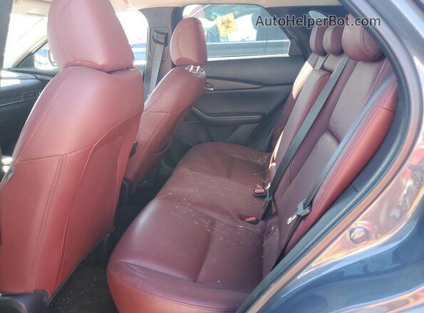 3MVDMBCM8RM662000 2024 MAZDA CX-30 Gray Vista de los asientos traseros