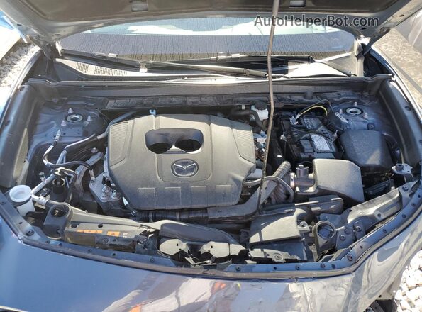 3MVDMBCM8RM662000 2024 MAZDA CX-30 Gray Vista interior trasera