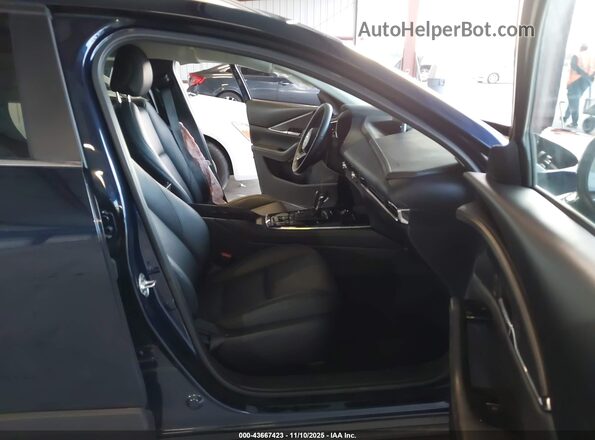 3MVDMBCM9SM791563 2025 MAZDA CX-30 Blue Front interior view