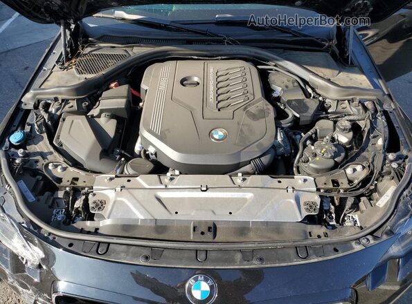 3MW43CM02P8D41465 2023 BMW M2 Black Սալոնի հետևի տեսք