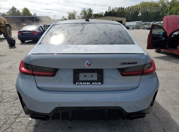 3MW49FF02P8C88716 2023 BMW M3 Gray Հետևի տեսք