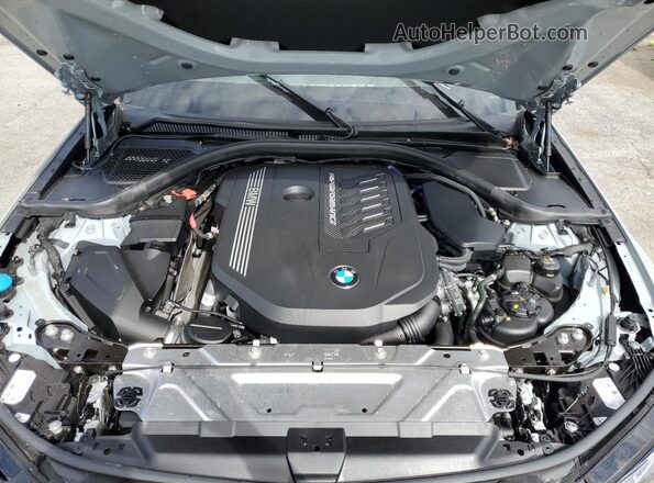 3MW49FF02P8C88716 2023 BMW M3 Gray Սալոնի հետևի տեսք