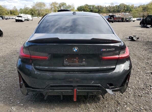 3MW49FF04P8D69393 2023 BMW M3 Black Vista trasera