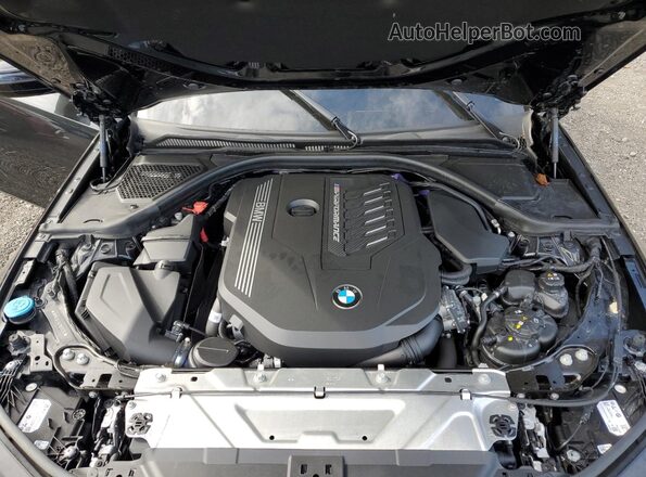 3MW49FF04P8D69393 2023 BMW M3 Black Vista interior trasera
