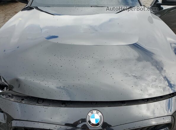 3MW53CM06S8F16829 2025 BMW M2 Black Вид задньої частини салону
