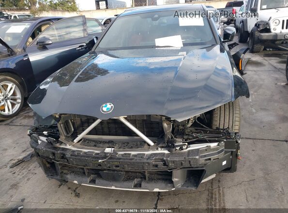 3MW59FT00S8F20599 2025 BMW M3 Black უკანა სალონის ხედი