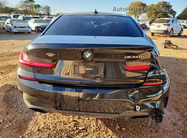 3MW5U7J04M8B55693 2021 BMW M3 Black Հետևի տեսք