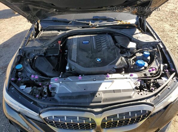 3MW5U9J0XM8B66029 2021 BMW M3 Black Вид задньої частини салону