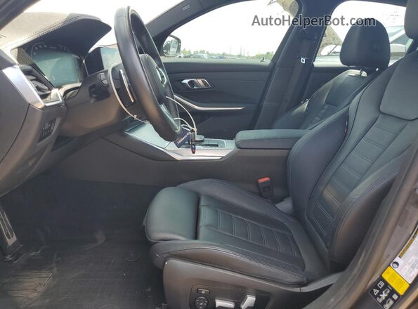 3MW5U9J0XM8C14287 2021 BMW M3 Серый Вид салона спереди