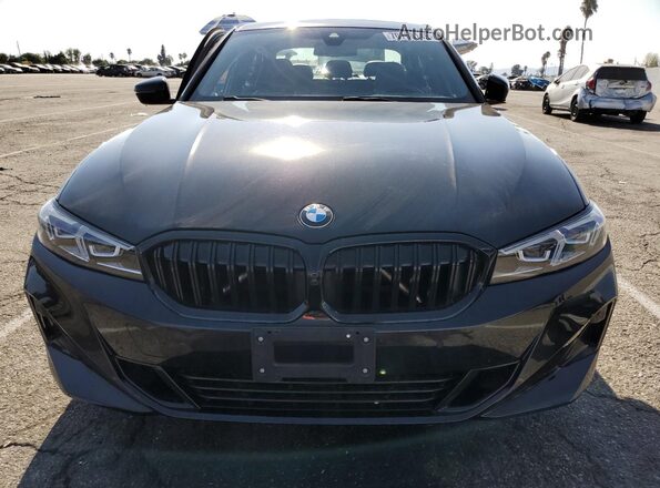 3MW69FF04P8D75090 2023 BMW 3 SERIES Black Front view