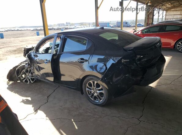 3MYDLBYV4KY508325 2019 TOYOTA YARIS Черный Задняя левая четверть