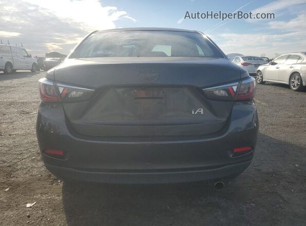 3MYDLBZV5GY138945 2016 TOYOTA SCION Gray Widok z tyłu