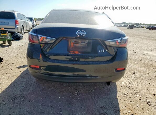 3MYDLBZV6GY128019 2016 TOYOTA SCION Черный Вид сзади