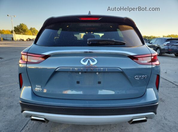3PCAJ5BB3PF123431 2023 INFINITI QX50 Blue Вид ззаду