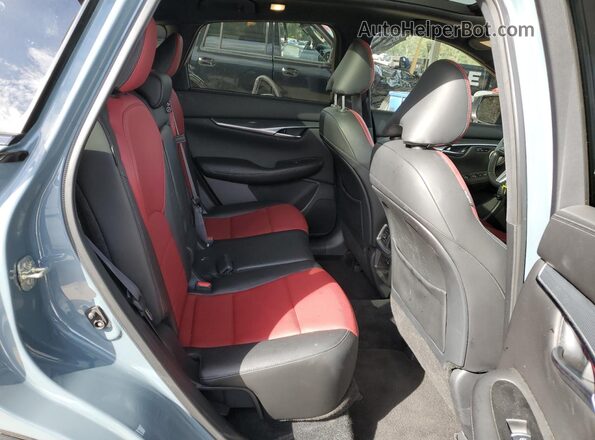3PCAJ5FA4RF105041 2024 INFINITI QX50 Blue Vista de los asientos traseros