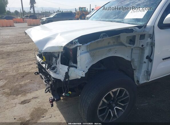 3TMBZ5DN3KM020115 2019 TOYOTA TACOMA Белый Вид спереди