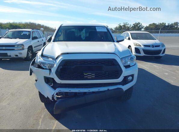 3TMBZ5DN9NM036176 2022 TOYOTA TACOMA White ხელსაწყოთა პანელის ხედი