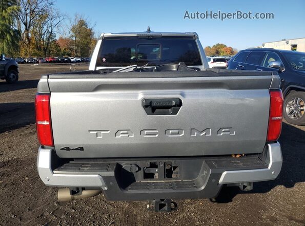 3TMLB5JN7RM004975 2024 TOYOTA LE Silver Вид ззаду