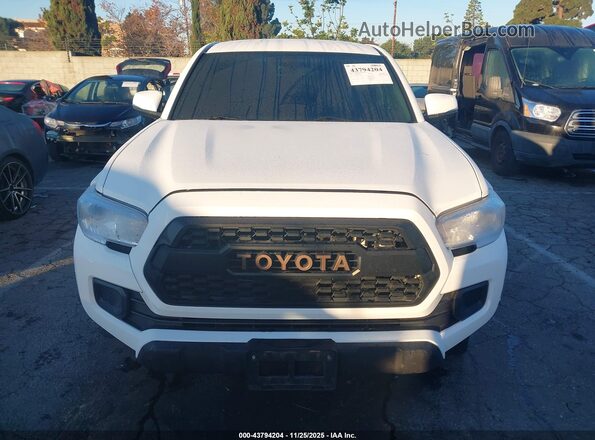 3TYCZ5AN9NT096276 2022 TOYOTA TACOMA White ხელსაწყოთა პანელის ხედი
