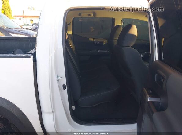 3TYCZ5AN9NT096276 2022 TOYOTA TACOMA White VIN კოდის სტიკერის ხედი