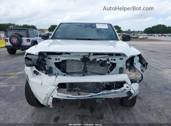 3TYJDAHN8RT010546 2024 TOYOTA TACOMA Белый Вид щитка приборов