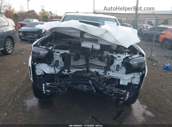 3TYLC5LN8ST023328 2025 TOYOTA TACOMA HYBRID White Widok wnętrza z tyłu