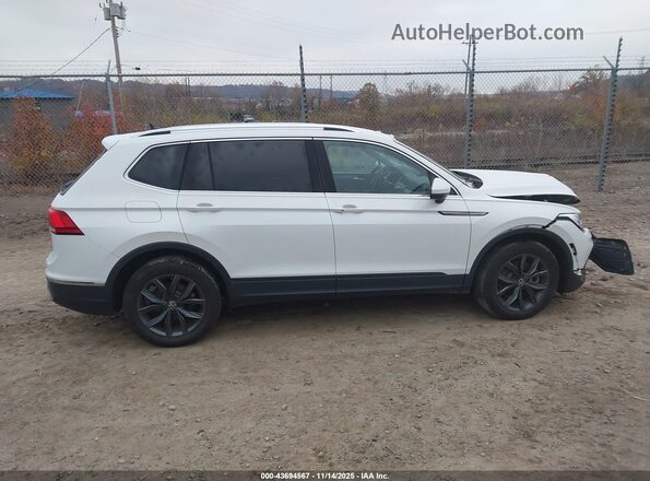 3VV2B7AX0PM019809 2023 VOLKSWAGEN TIGUAN White Widok wnętrza z tyłu