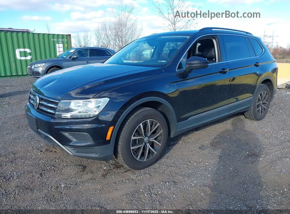 3VV2B7AX4MM129063 2021 VOLKSWAGEN TIGUAN Black Առջևի ձախ երեք քառորդ տեսարան