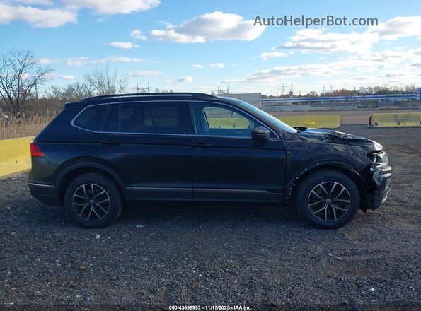 3VV2B7AX4MM129063 2021 VOLKSWAGEN TIGUAN Black Սալոնի հետևի տեսք