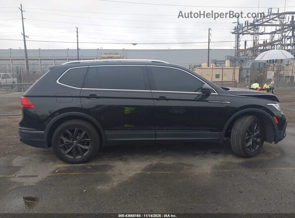 3VV3B7AX3NM062512 2022 VOLKSWAGEN TIGUAN Black Vista interior trasera