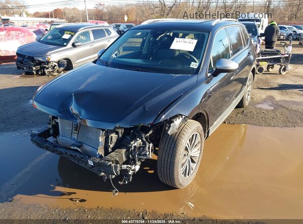 3VVAB7AX1RM226868 2024 VOLKSWAGEN TIGUAN Black Front view