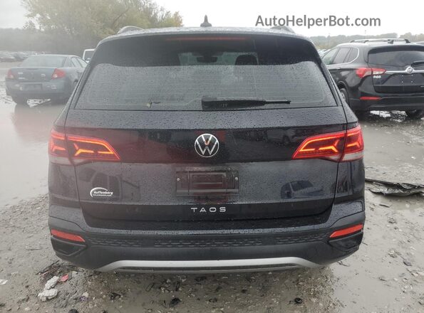 3VVDX7B2XNM017883 2022 VOLKSWAGEN TAOS Black Rear view