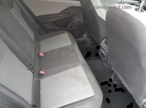 3VVDX7B2XNM017883 2022 VOLKSWAGEN TAOS Black Rear seats view