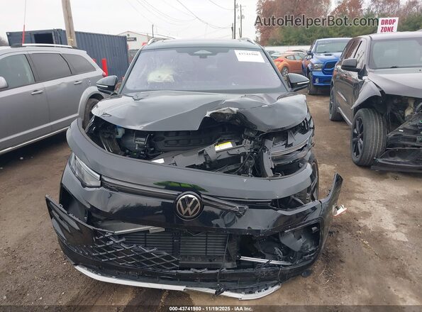 3VVLR7RM6SM033877 2025 VOLKSWAGEN TIGUAN Black Սալոնի հետևի տեսք