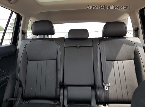 3VVNB7AX0RM077211 2024 VOLKSWAGEN TIGUAN Black Rear seats view