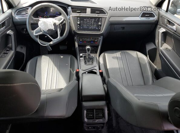 3VVNB7AX0RM077211 2024 VOLKSWAGEN TIGUAN Black Dashboard view