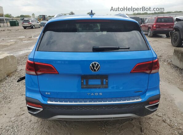 3VVUX7B2XRM074381 2024 VOLKSWAGEN TAOS Blue Հետևի տեսք