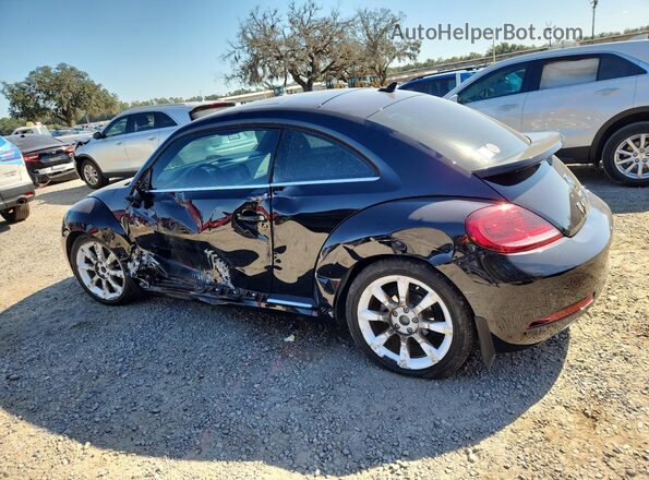 3VWFD7AT2KM713981 2019 VOLKSWAGEN BEETLE Black 