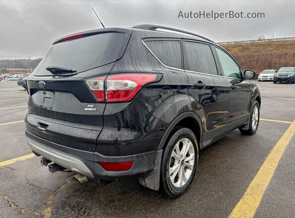 1FMCU9GD0JUA75530 2018 FORD ESCAPE Black Front view